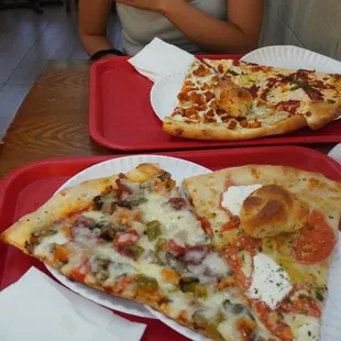 Mixed veggie and meat pizza, Tomato and feta pizza, Garlic Bread, Buffalo chicken pizza, margherita pizza