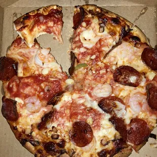 Shrimp garlic pepperoni and onion.   Double cheese double sauce well done.