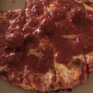 Cheese pizza with a side order of meatballs poured on top.  I double sauce dare you to try this!!!!!