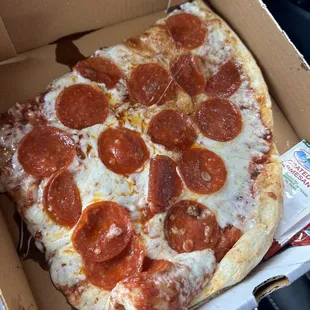 Two slices of pepperoni