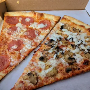 Pizza by the slice is pretty large. Pepperoni and mushroom.