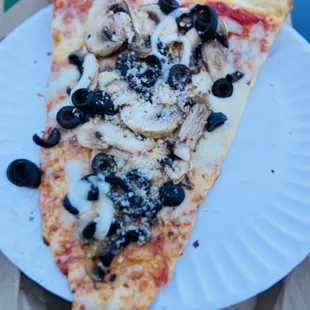 Pizza Slice with Mushrooms and Black Olives