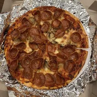 Pepperoni and mushroom pizza