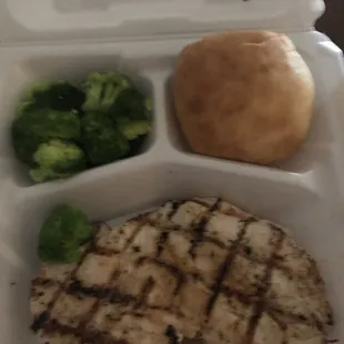 Grilled chicken, broccoli and a roll. Roll was a little too &quot;soaked&quot; in butter.