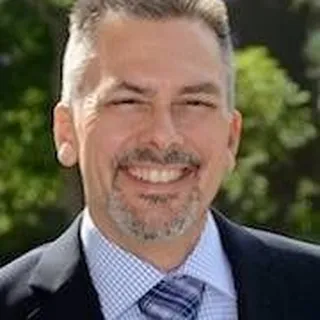 Mark L.