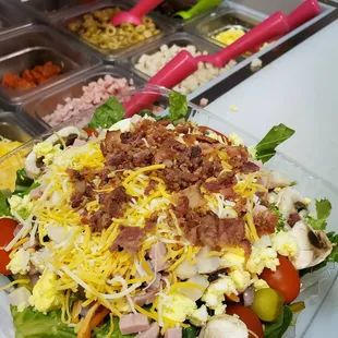 a salad in a plastic container