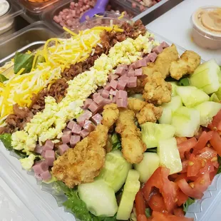 a salad in a plastic container