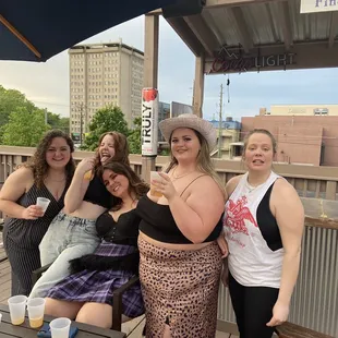 a group of women posing for a picture