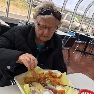 Loving her shrimp lunch - great way to celebrate