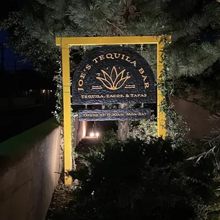 a sign for joe's tequila bar