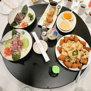 Tuna avocado salad, shrimp toast with fried squid, dumplings, seared ahi tuna