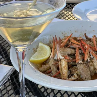 Dirty martini, extra dirty with blue cheese stuffed olives and garlic crab claws.