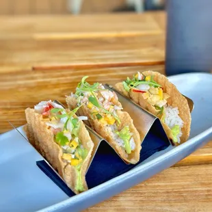 LOBSTER &amp; SHRIMP SUSHI TACOS* mango, coconut lime dressing, avocado mousse, sushi rice, crispy wonton shells