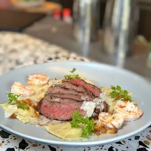 STEAK &amp; RAVIOLI BIANCO* | sliced 'prime' top sirloin, shrimp,crispy onions,grana padano,truffle beurre blanc sauce