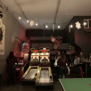 Some skee-ball with basketball shooting game.