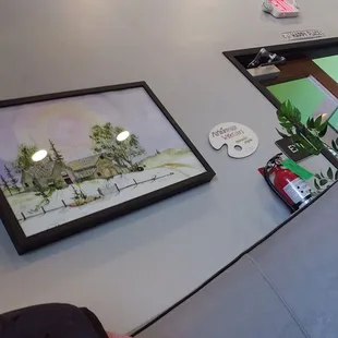 a picture of a table with a picture of a church
