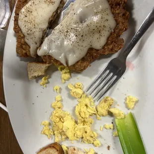 a plate of food with a fork and knife