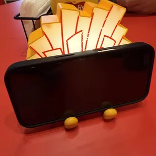 Phone stand at every table