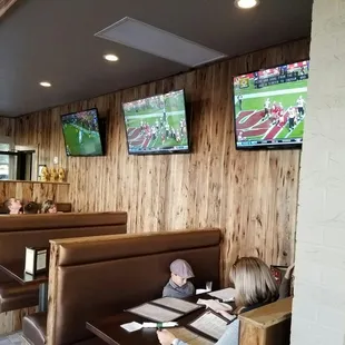More tvs...lots of natural light on the enclosed patio