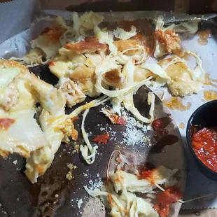 CHEESE covered in GREASE with hardly any toppings inside