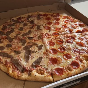 Home of the Big Apple Pizza (24")