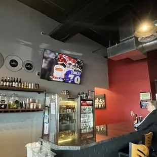 Customers enjoying pizza, beer and Sunday football game!