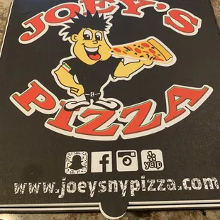 a pizza box with a cartoon character on it