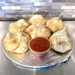 Come on in and try our new Garlic Knots!