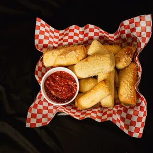 Full order of bread sticks with our house marinara.