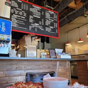 The overhead menu board.