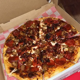 Meat lovers Pizza (pepperoni, sausage, and bacon)