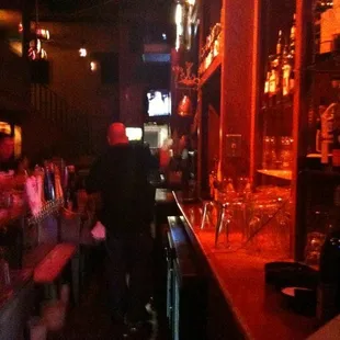 a man standing at a bar