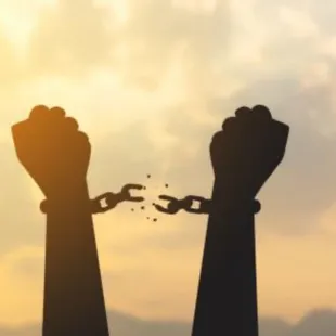 two hands chained to each other