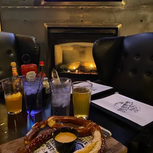 Table by the fireplace   and a warm Bavarian Pretzel