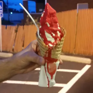 Vanilla soft serve waffle cone cherry dip aka the Carrie on prom night special