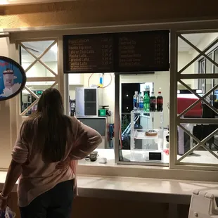 a woman looking out the window