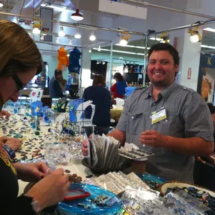 Dichrodreams Inc. at J.O.G.S. Tucson Gem and Jewelry Show selling dichroic glass jewelry wholesale