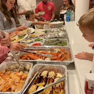 a group of people preparing food