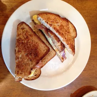 Crab cake, ham, egg, and swiss on wheat. Solid sandwich!