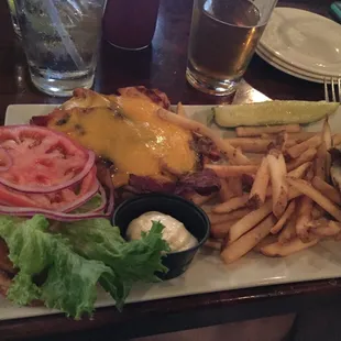 Max It - gilled chicken breast with cheddar, crisp bacon and barbecue sauce on brioche bun.