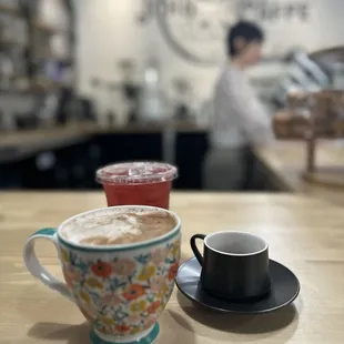 two cups of coffee on a table