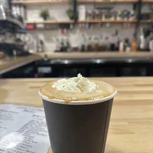 a cup of coffee on a table
