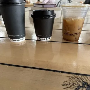 three cups of coffee on a table