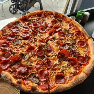 16&quot; Mostly Meat Pizza minus the ham.  $23.99 as of 1/21/23.