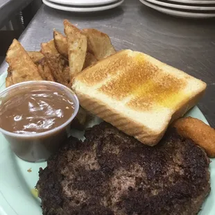 Chop steak with fries , mushroom gravy on the side