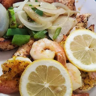 a plate of seafood and potatoes