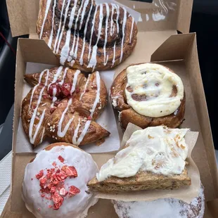 a variety of pastries in a box
