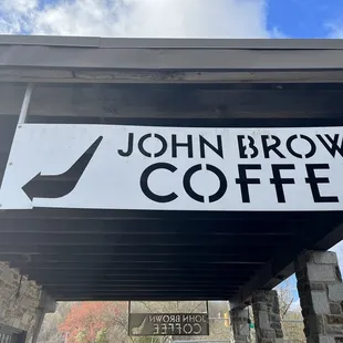 a sign for john brown coffee
