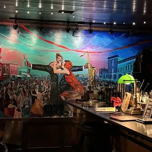 a mural of a couple dancing