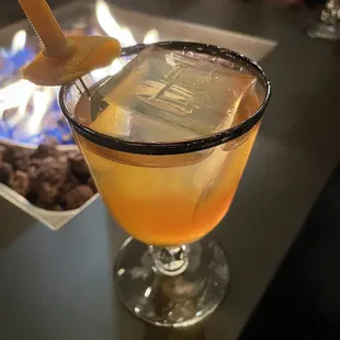 a cocktail in a coupe glass
